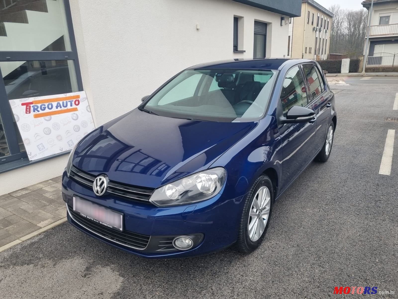 2012' Volkswagen Golf VI 1,6 Tdi photo #1