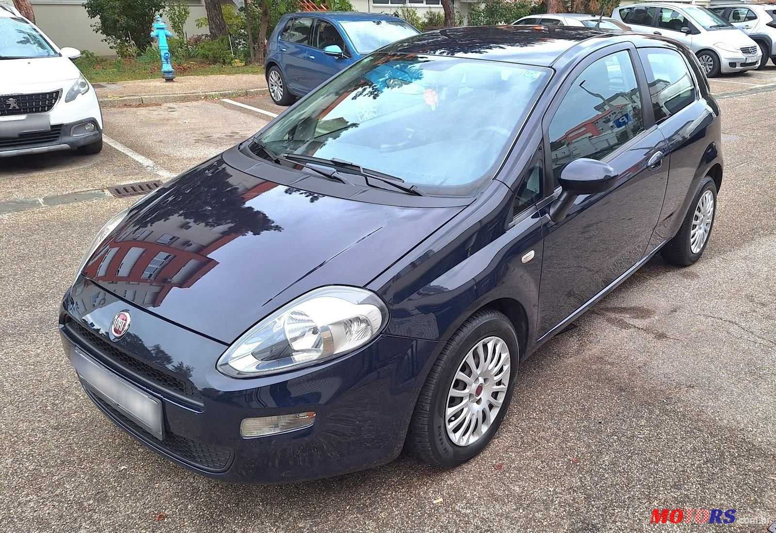 2014' Fiat Grande Punto 1.3 Jtd photo #2
