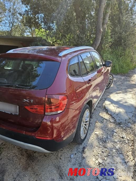 2011' BMW X1 Xdrive18D photo #5