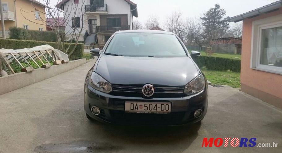 2011' Volkswagen Golf VI 1,6 Tdi photo #1