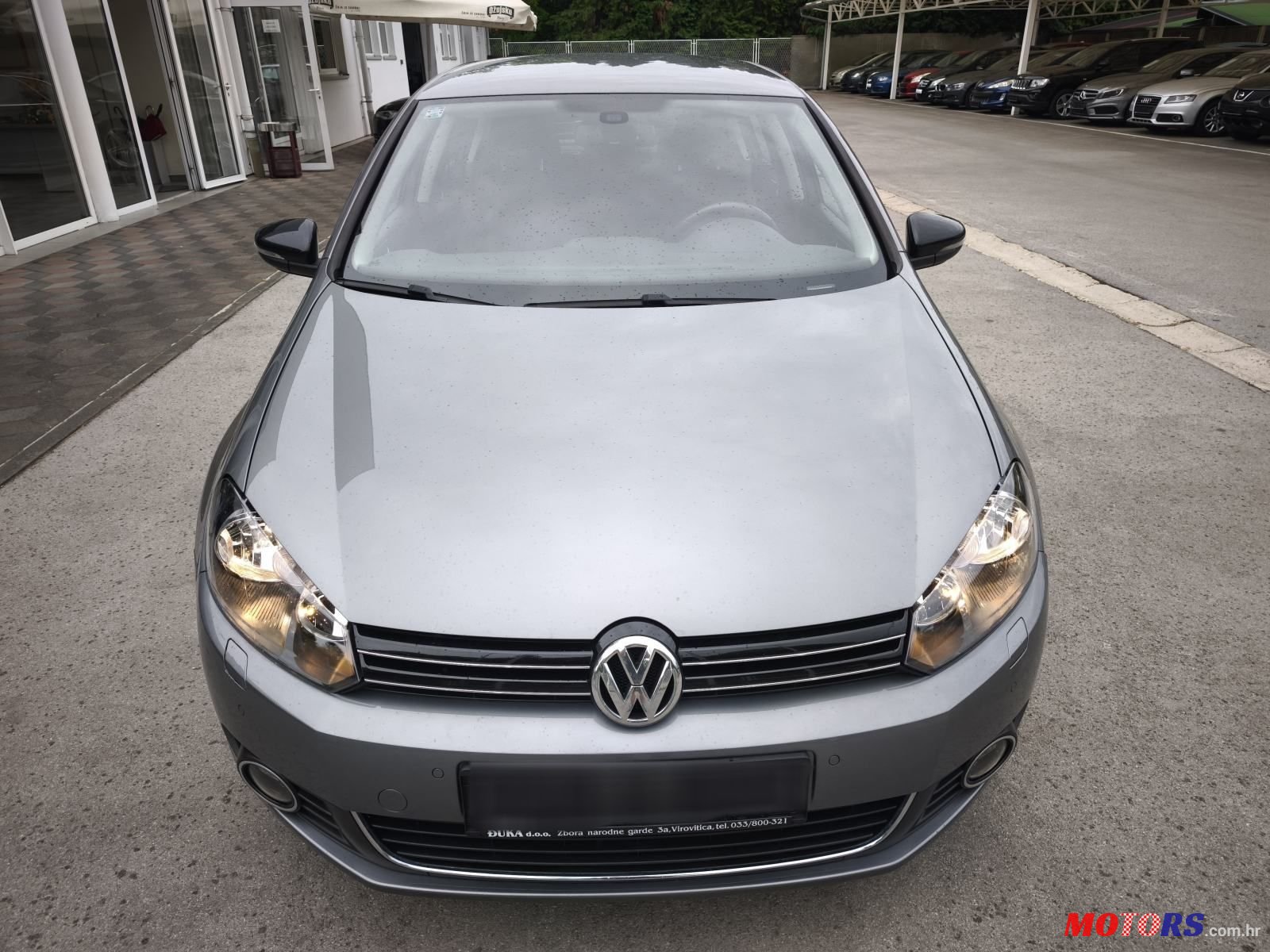 2012' Volkswagen Golf VI 1,6 Tdi photo #3