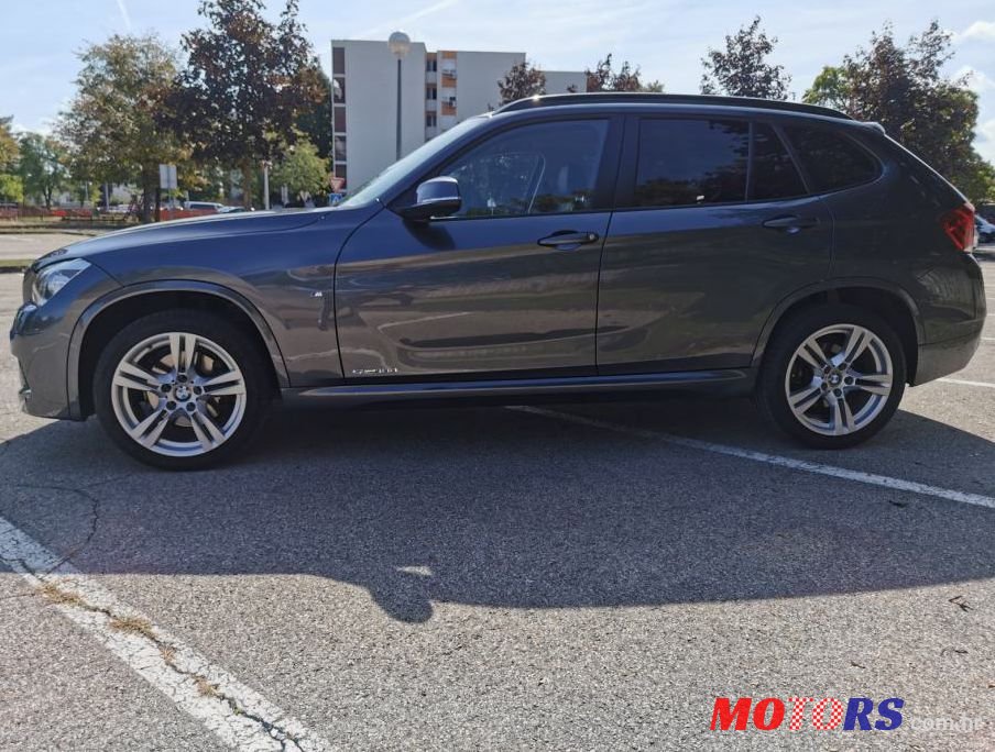2013' BMW X1 Sdrive18D photo #1