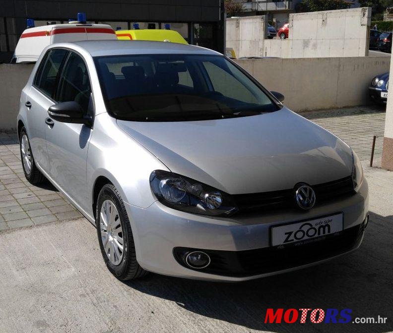 2012' Volkswagen Golf VI 1,6 Tdi photo #1