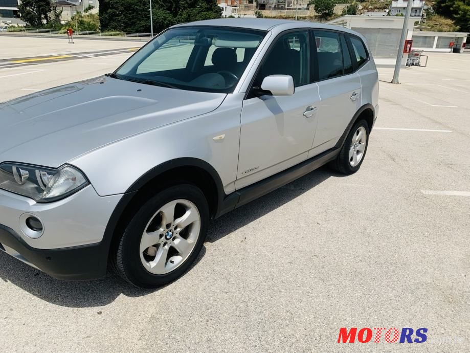 2009' BMW X3 Xdrive20D photo #2