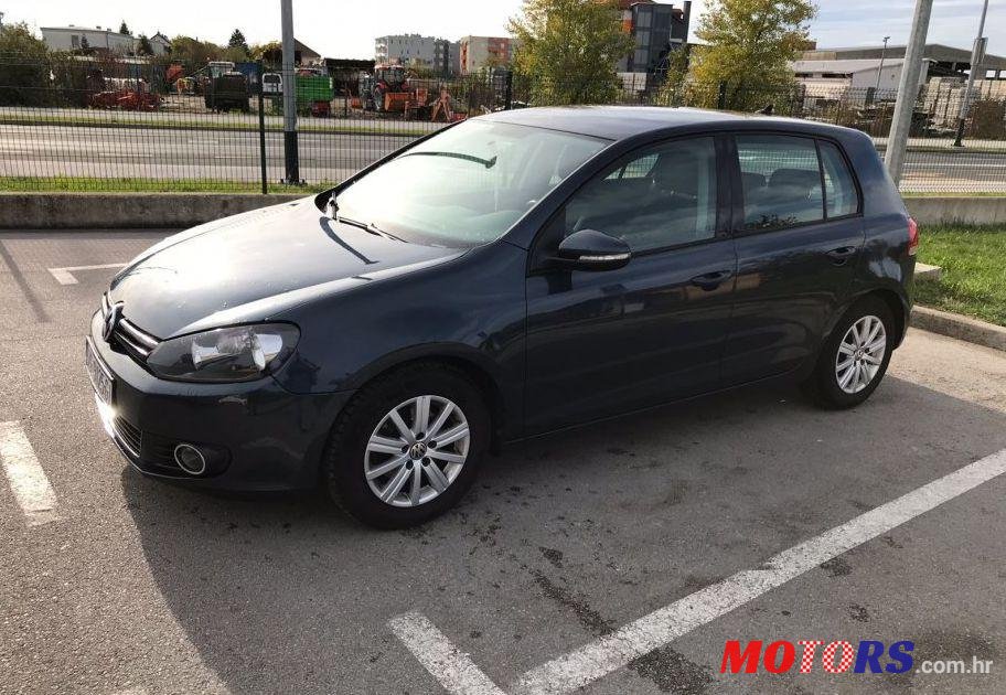 2012' Volkswagen Golf VI 1,6 Tdi photo #2