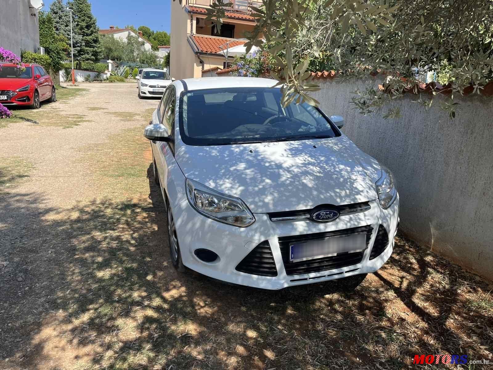 2013' Ford Focus 1,6 photo #1