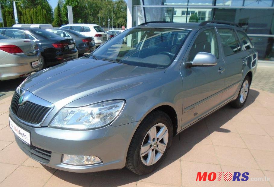 2013' Skoda Octavia Combi 1,6 Tdi photo #1