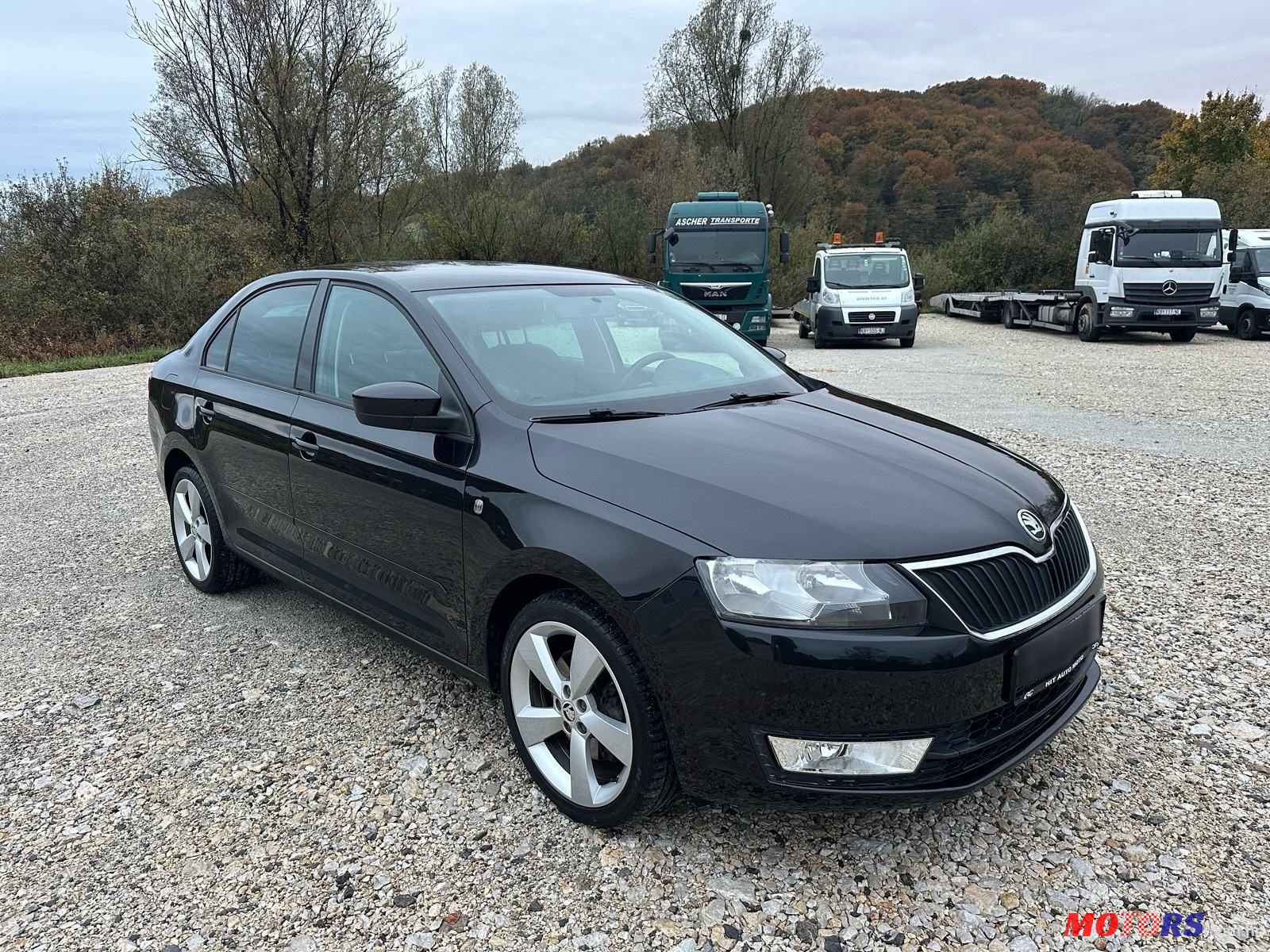 2012' Skoda Rapid 1.2 Tsi photo #3