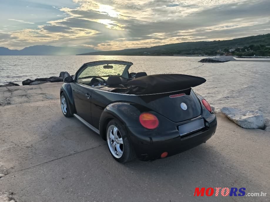 2004' Volkswagen Beetle 1,4 photo #2