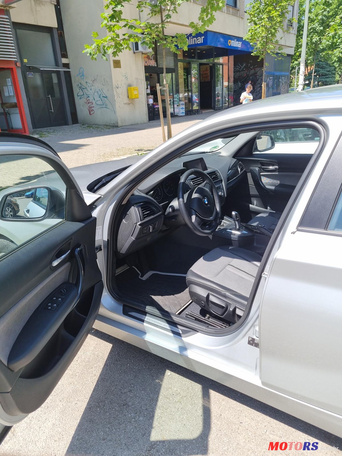 2012' BMW 118 D photo #3