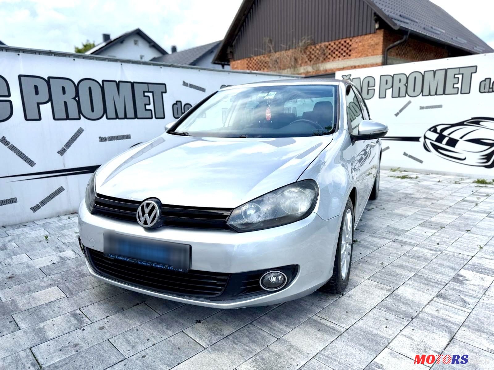 2011' Volkswagen Golf VI 1,6 Tdi photo #1