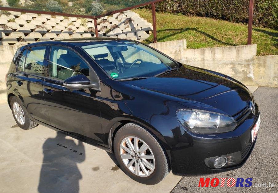 2010' Volkswagen Golf VI 1,6 Tdi photo #1