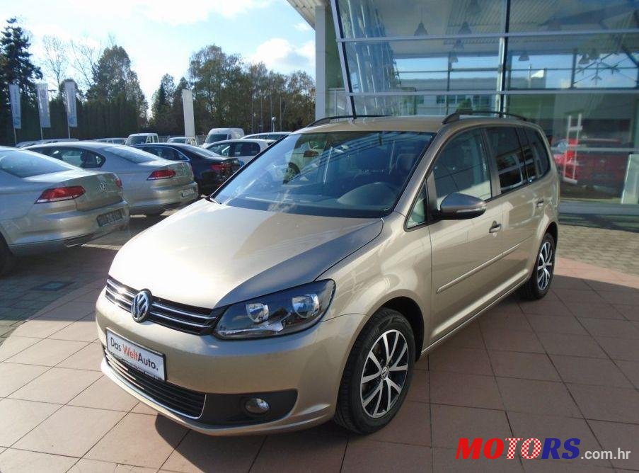 2014' Volkswagen Touran 1,6 Tdi photo #1