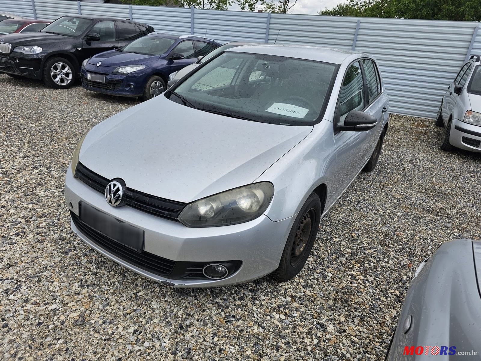 2009' Volkswagen Golf VI 1,6 photo #1