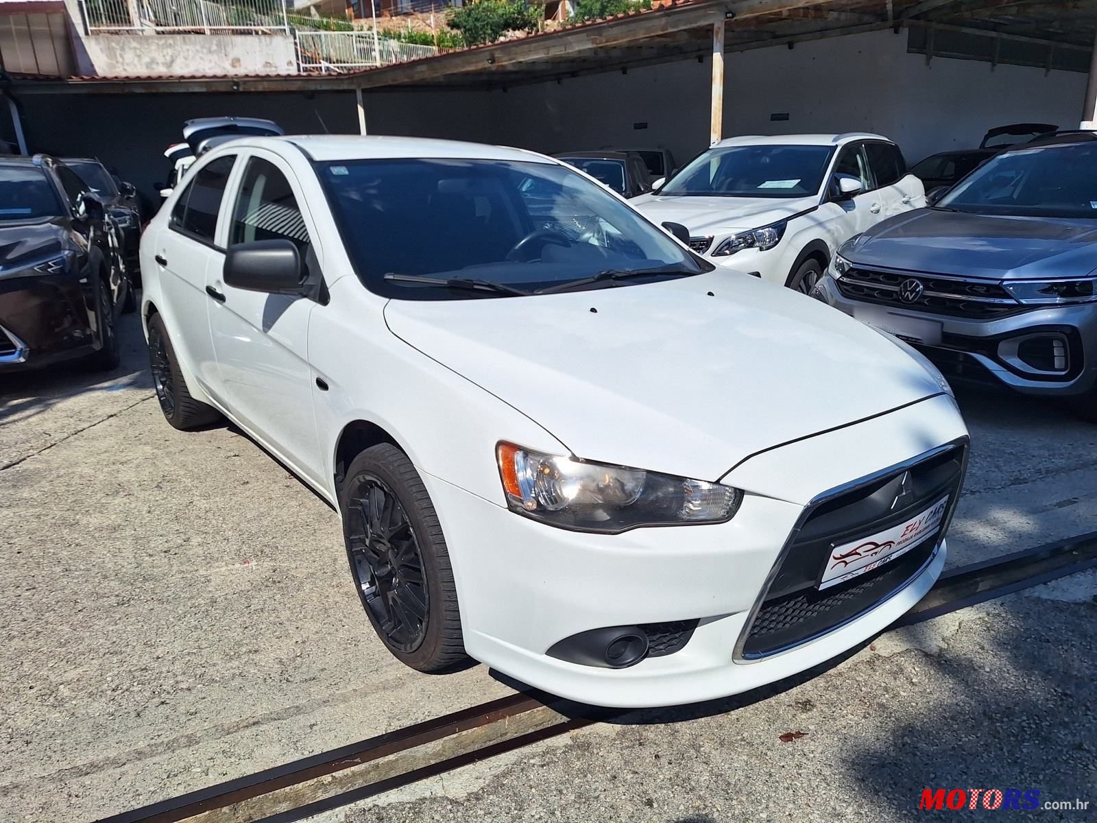2010' Mitsubishi Lancer 1,5 photo #2