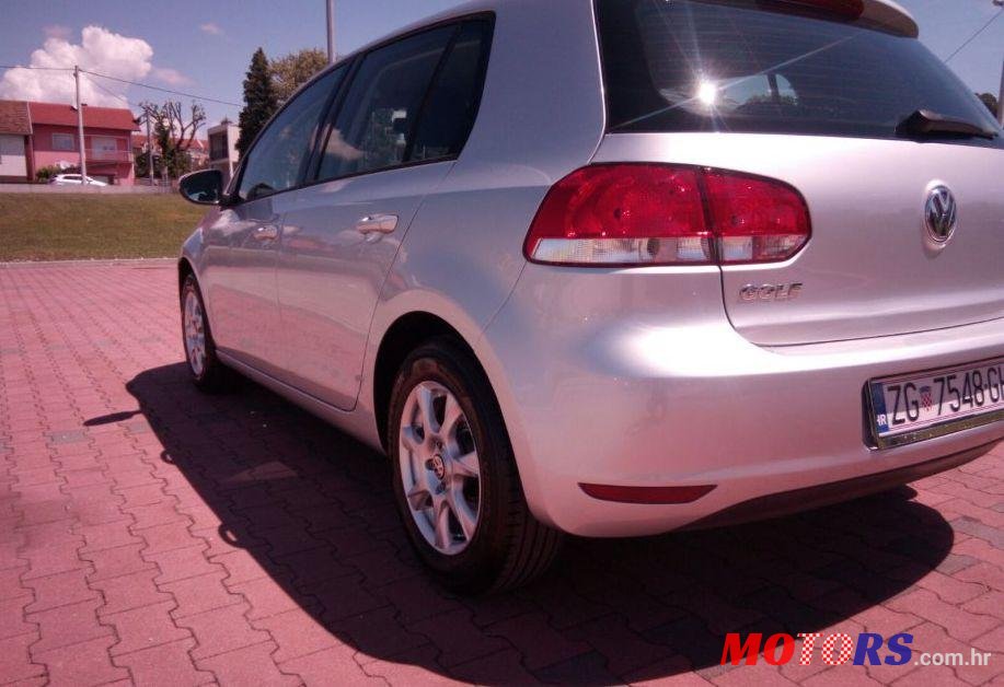 2012' Volkswagen Golf VI 1,6 Tdi photo #1
