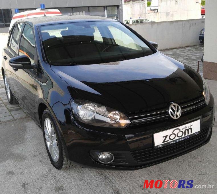 2012' Volkswagen Golf VI 1,6 Tdi photo #2