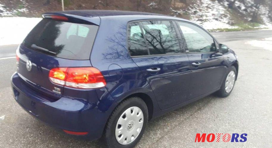 2012' Volkswagen Golf VI 1,6 Tdi photo #2