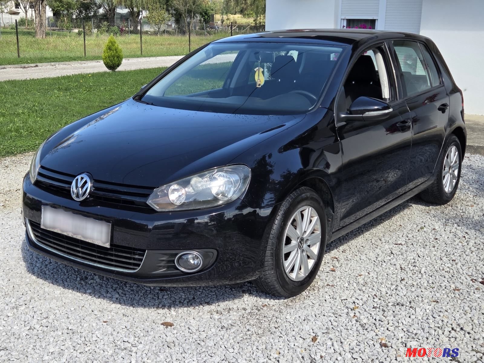 2012' Volkswagen Golf VI photo #1