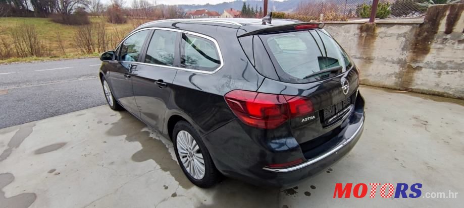 2014' Opel Astra Karavan photo #4