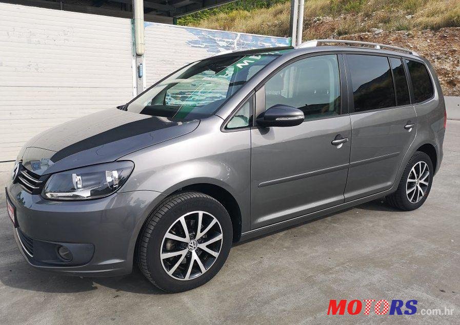 2015' Volkswagen Touran 1,6 Tdi Bmt photo #1