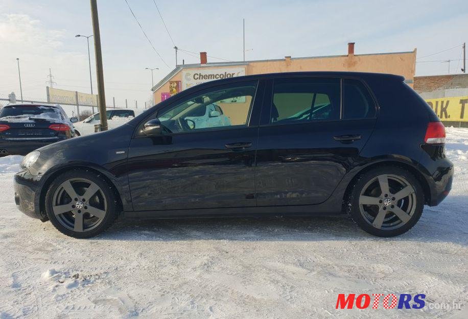 2012' Volkswagen Golf VI 1,6 Tdi photo #1