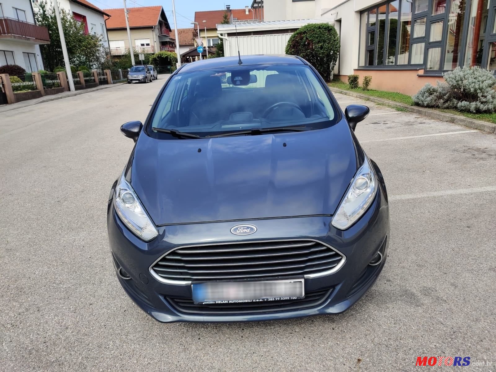 2014' Ford Fiesta 1,6 photo #1