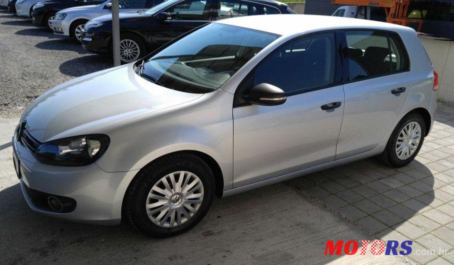 2012' Volkswagen Golf VI 1,6 Tdi photo #2