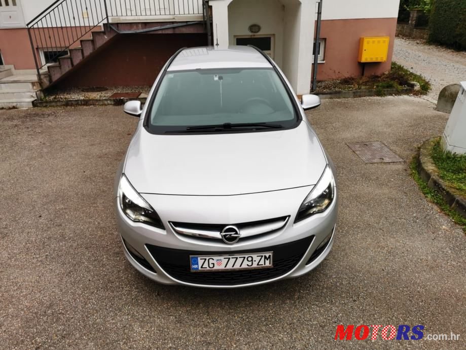 2014' Opel Astra Karavan photo #2