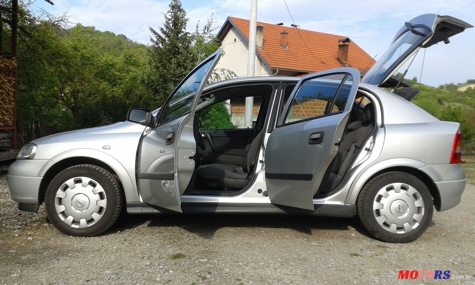 2009' Opel Astra G photo #1