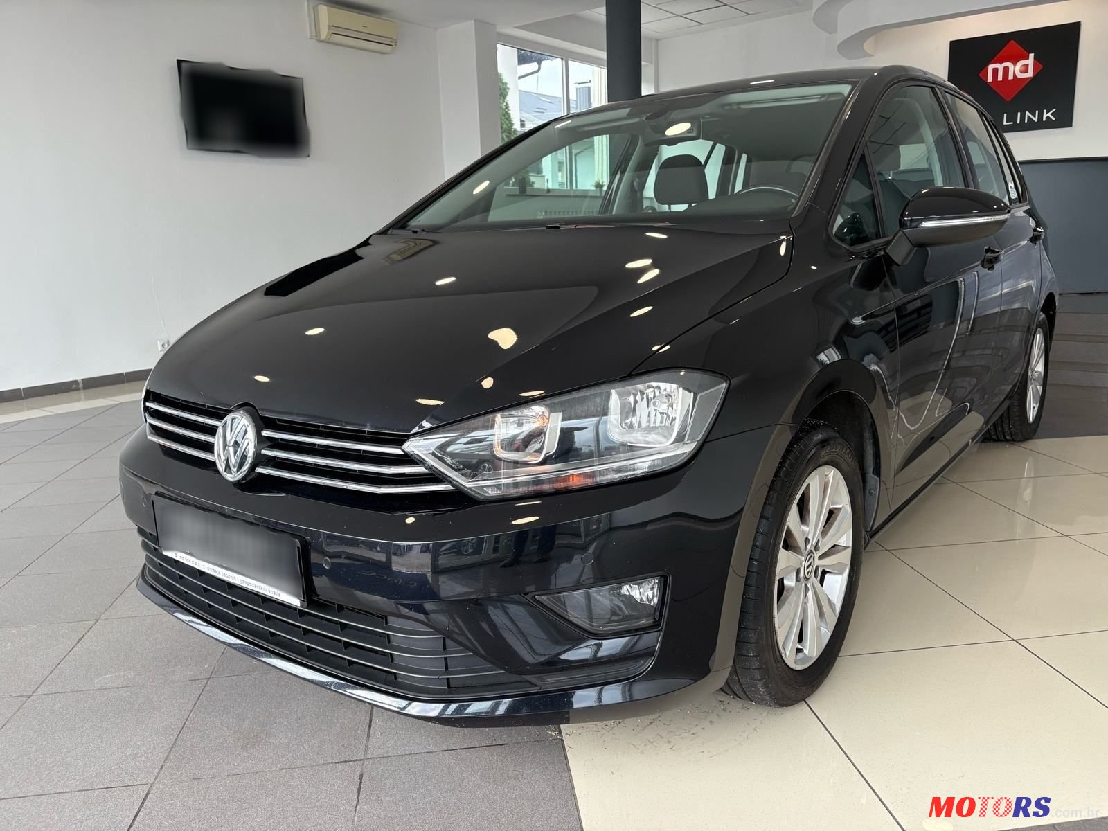 2015' Volkswagen Golf Sportsvan photo #1