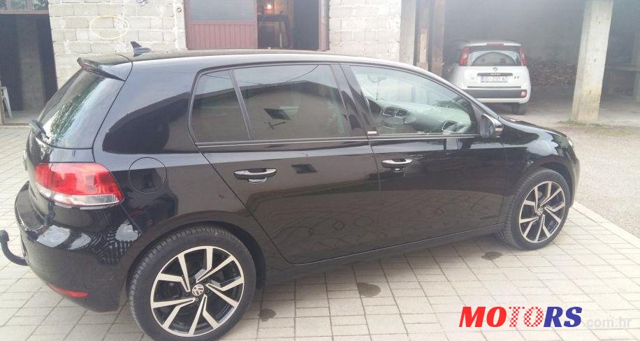 2013' Volkswagen Golf VI 1,6 Tdi photo #1