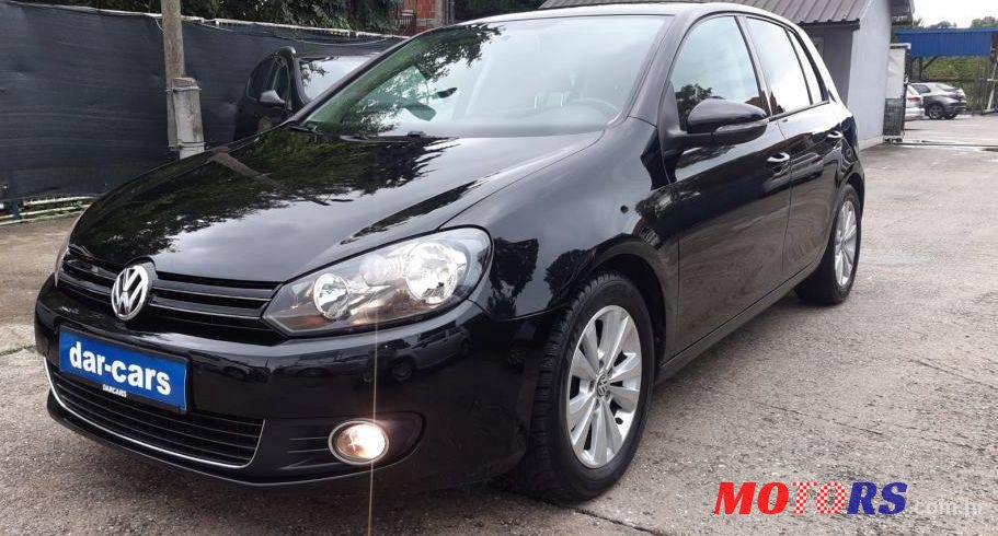 2011' Volkswagen Golf VI 1,6 Tdi photo #1