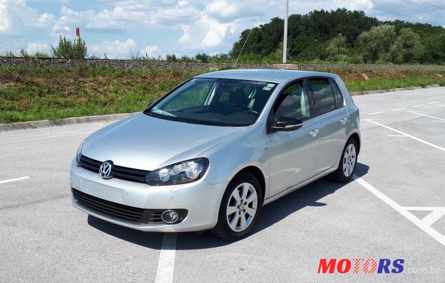 2012' Volkswagen Golf VI 1,6 Tdi photo #1
