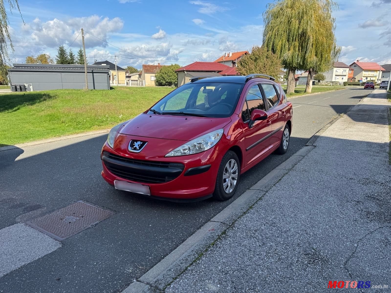 2008' Peugeot 207 Sw photo #1