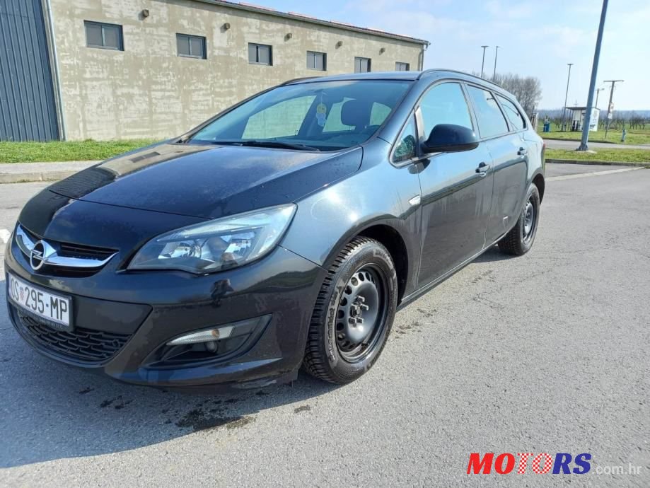 2014' Opel Astra Karavan photo #1