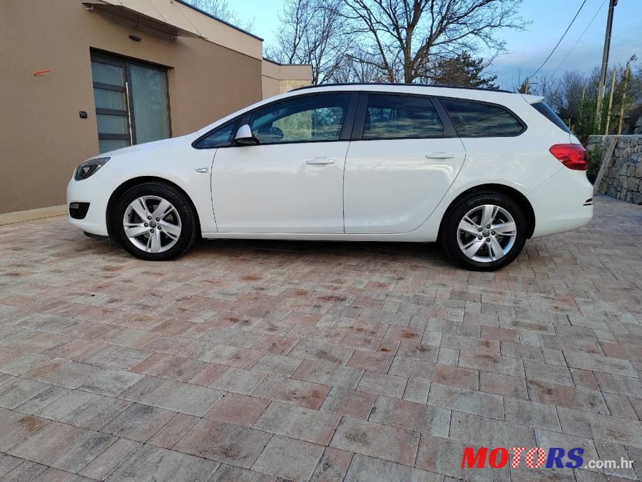 2014' Opel Astra Karavan photo #3