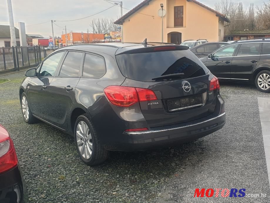 2014' Opel Astra Karavan photo #4