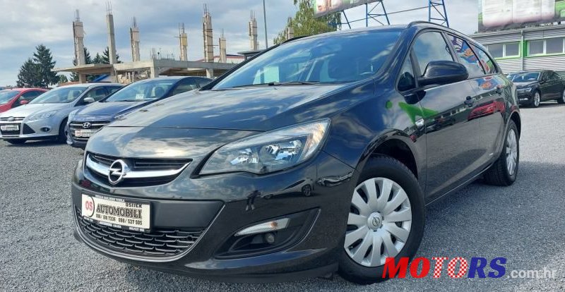 2015' Opel Astra Karavan photo #1