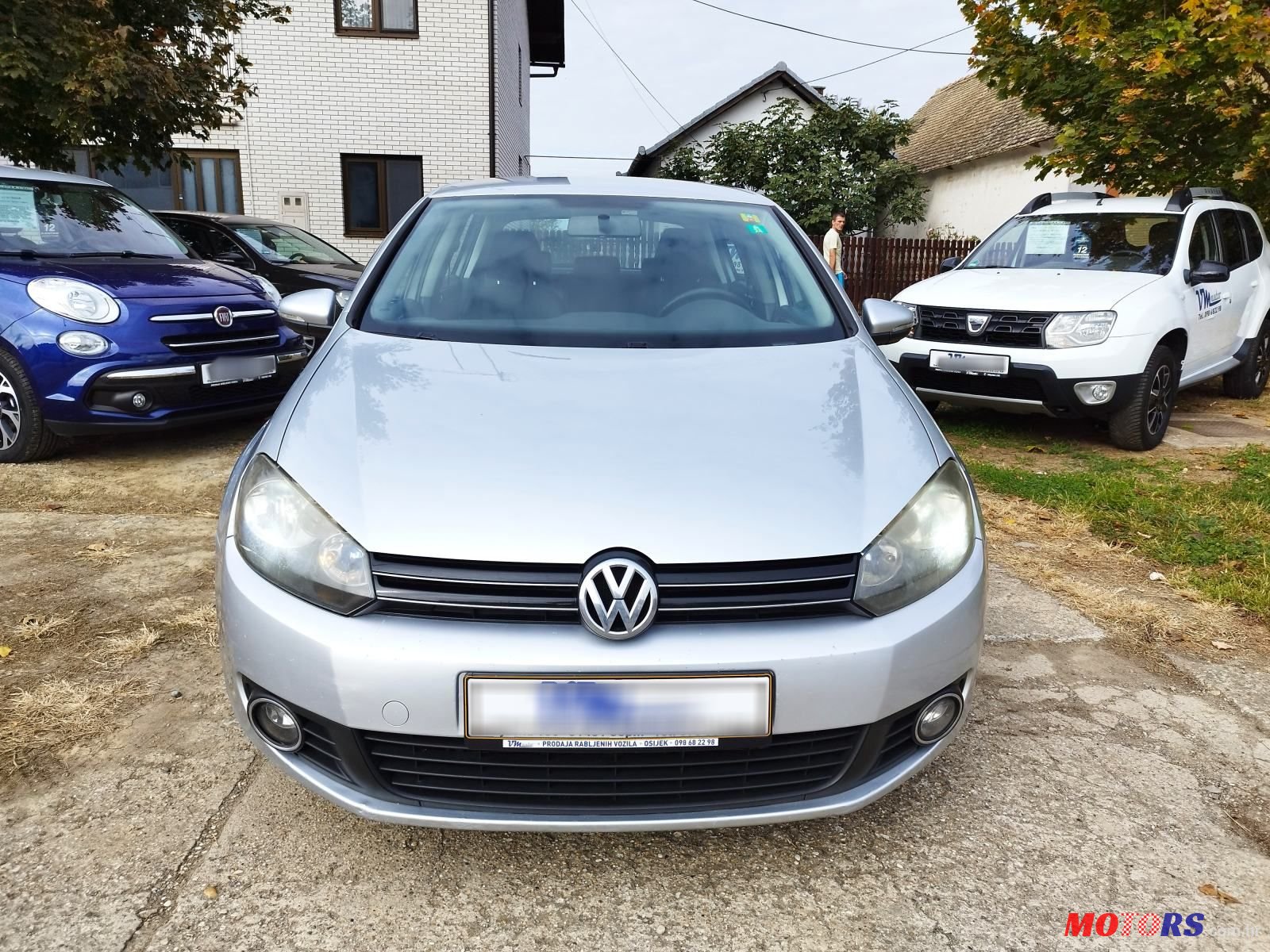 2011' Volkswagen Golf VI 1,6 Tdi photo #1