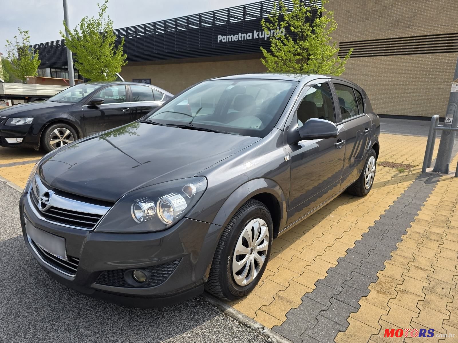 2011' Opel Astra 1,6 photo #1