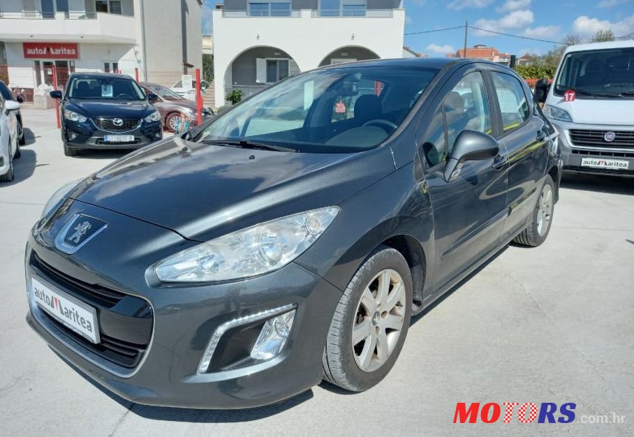 2013' Peugeot 308 1,6 E-Hdi photo #1