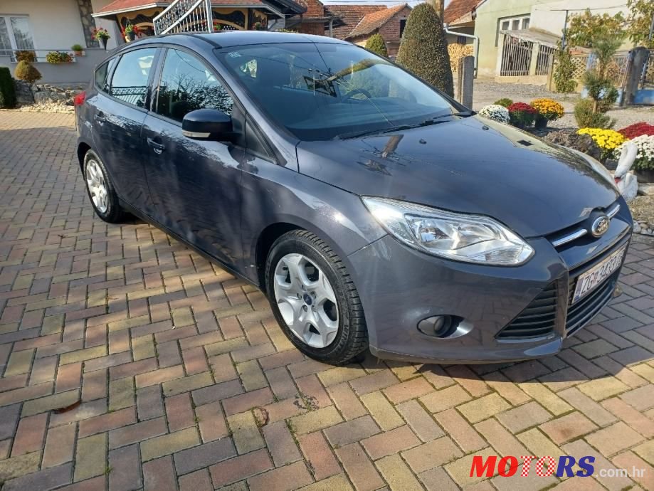 2011' Ford Focus 1,6 photo #1