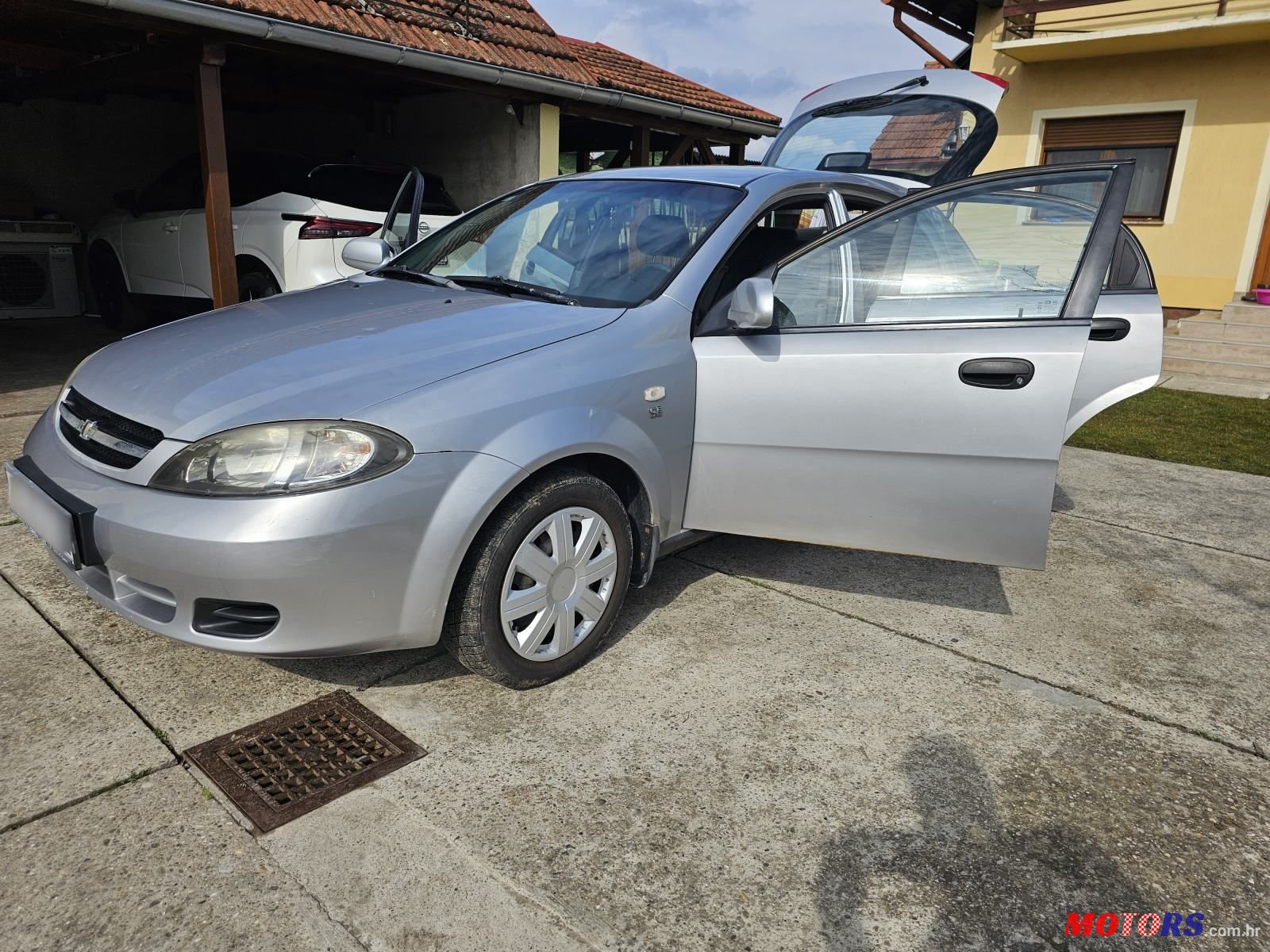 2004' Chevrolet Lacetti 1,4 Se photo #1