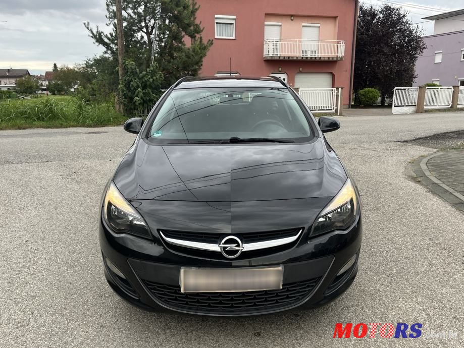 2014' Opel Astra Karavan photo #4