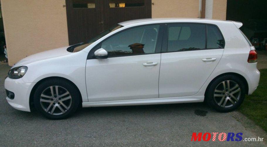 2011' Volkswagen Golf VI 1,6 Tdi photo #2