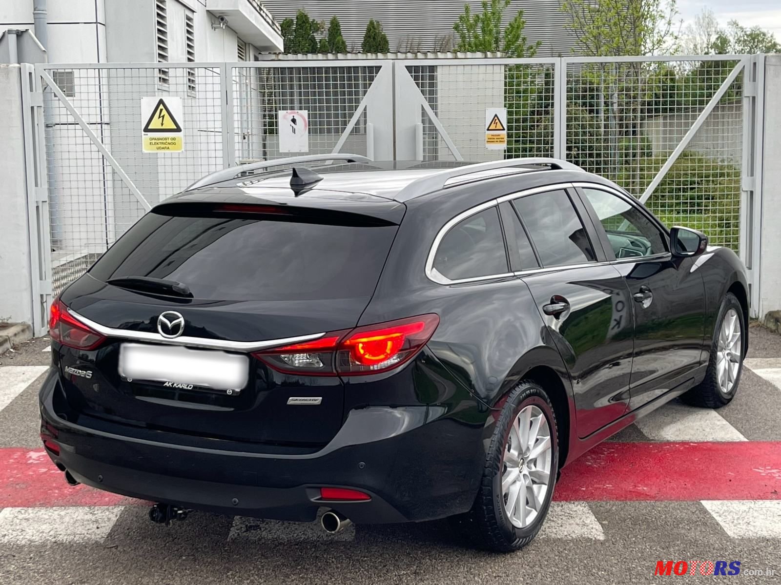 2015' Mazda 6 Sport Combi photo #6