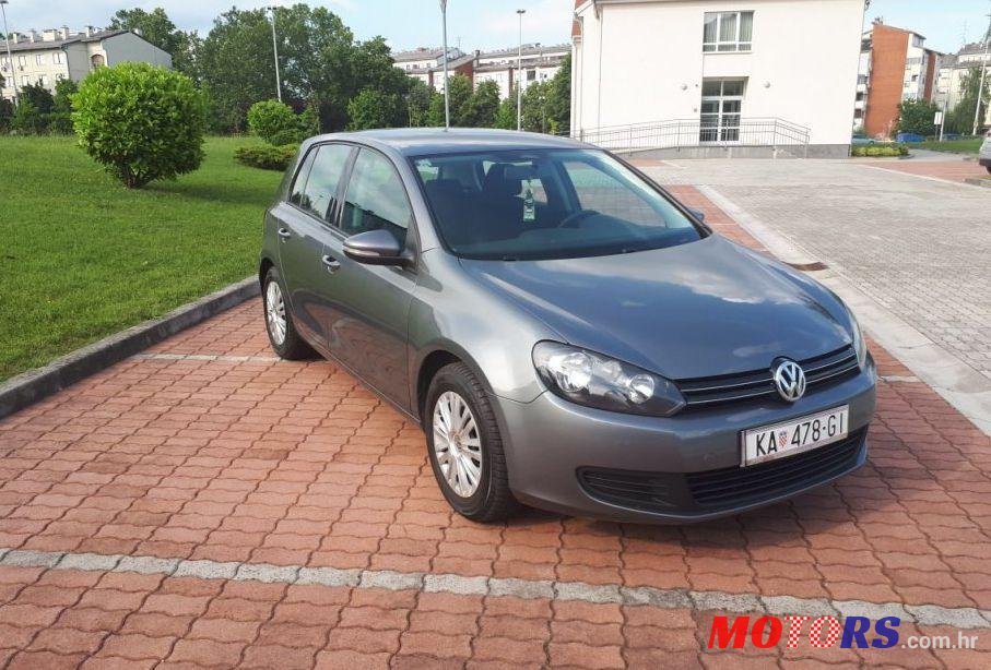 2009' Volkswagen Golf VI 1,6 Tdi photo #1