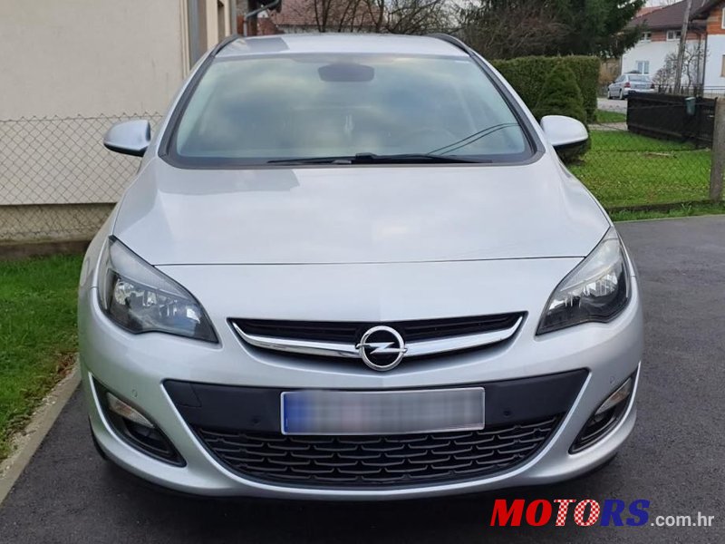 2014' Opel Astra Karavan photo #4