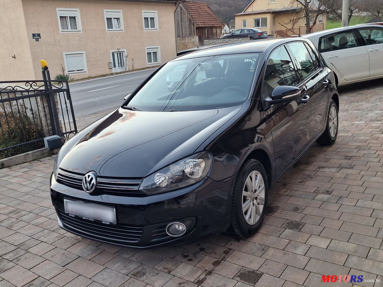 2012' Volkswagen Golf VI 1,6 Tdi photo #1